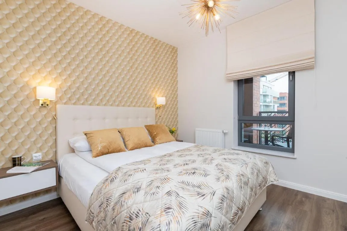 Image of Elegant Apartment with Balcony and Air Conditioning in Gdańsk by Renters