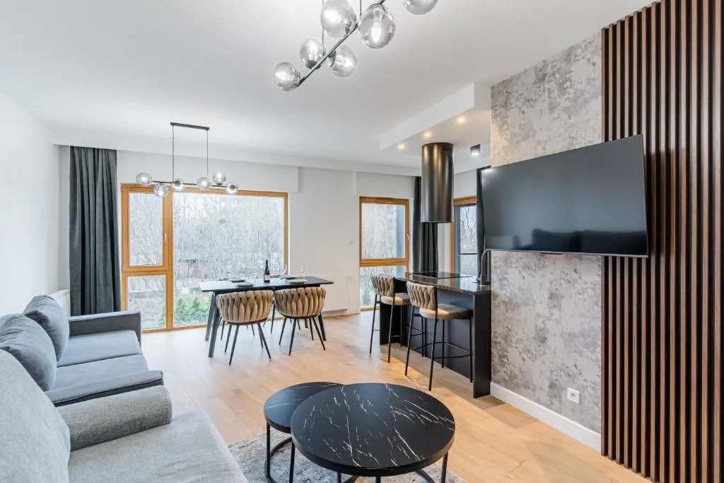 Image of ApartMate- Oldtown Sienna Grobla Comfy Apartment sauna & free gym