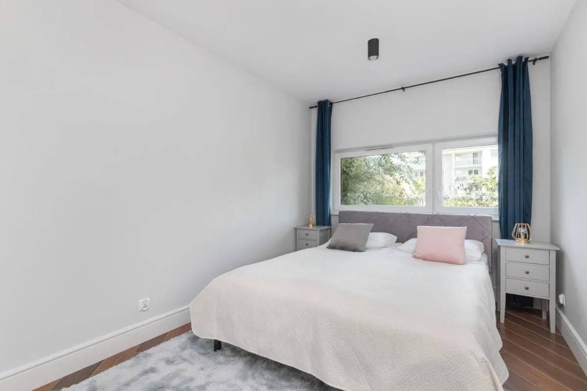 Image 1 of Exceptional Apartment with Charming Garden and Parking by Noclegi Renters