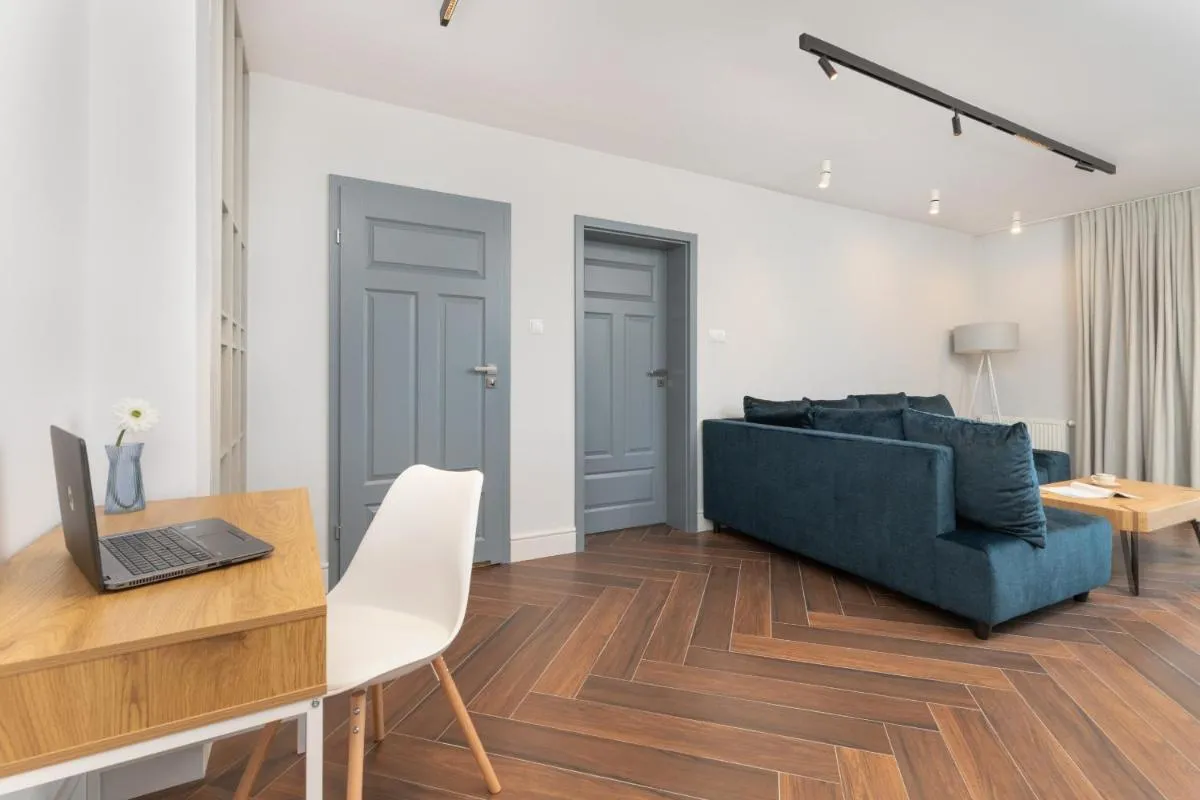 Image 4 of Exceptional Apartment with Charming Garden and Parking by Noclegi Renters