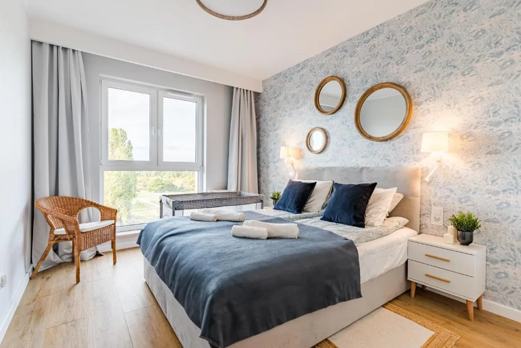 Image of Golden Reagan by Aparo – Nowy Apartament, Winda, Łóżeczko Turystyczne, Plaża 500m, Balkon, 2 Sypialnie oraz Salon, Rowerownia, Biurko