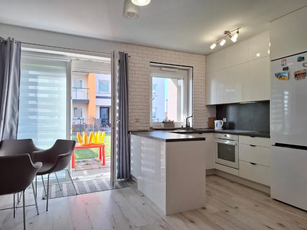 Image of Mieszkanie 46m2 – 2 pokojowe z ogródkiem , WIFI , Bezpłatny parking nr 126, Szybkie połączenie z lotniskiem, autobus 120