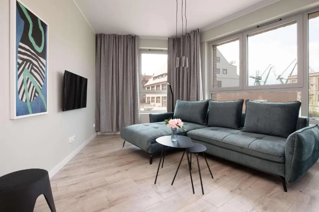 Image of Elegancki Apartament Blisko Rzeki w Gdańsku z Parkingiem by Noclegi Renters