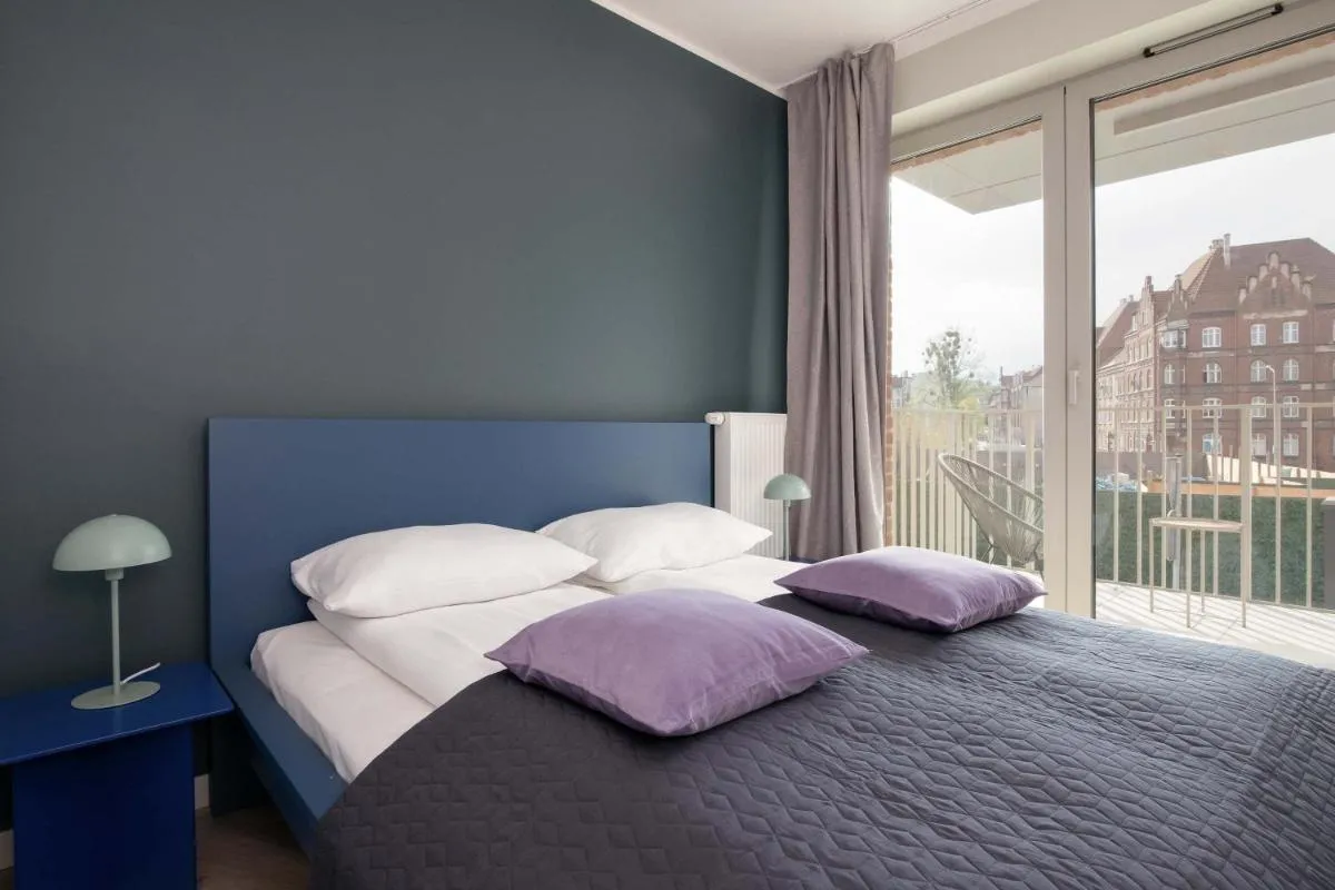 Image 1 of Elegancki Apartament Blisko Rzeki w Gdańsku z Parkingiem by Noclegi Renters