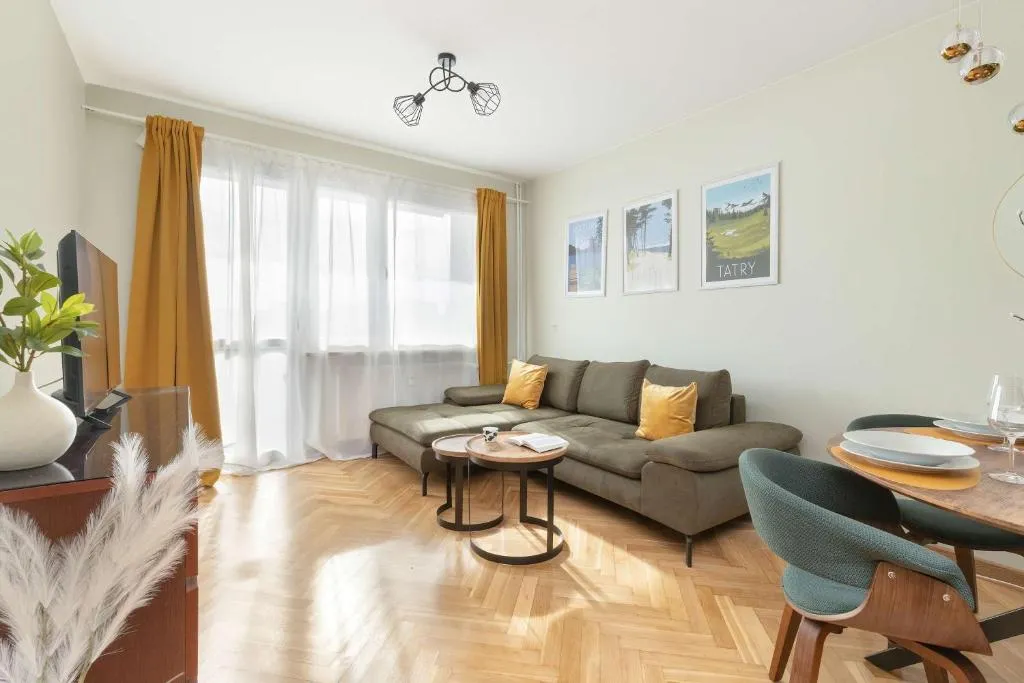 Image of Jasny Apartament z Pięknym Widokiem na Miasto by Noclegi Renters