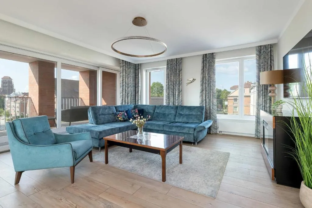 Image of Luxury Apartment with Three Bedrooms Air Conditioning and Parking by Noclegi Renters