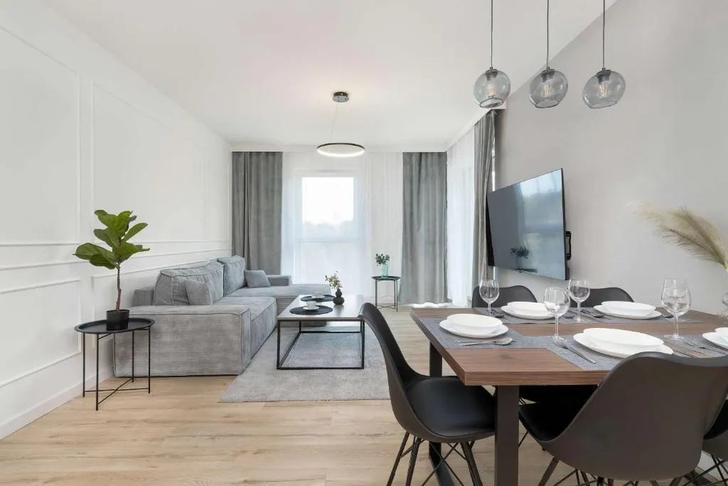 Image of Nowa Letnica Apartment with Balcony & Parking Arena Gdańsk by Noclegi Renters