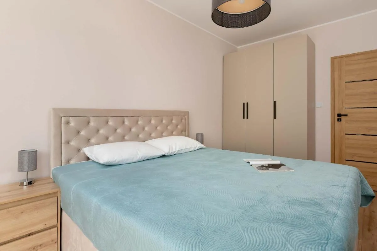 Image 1 of Przytulny Apartament z Ogródkiem i Parkingiem by Rent like home