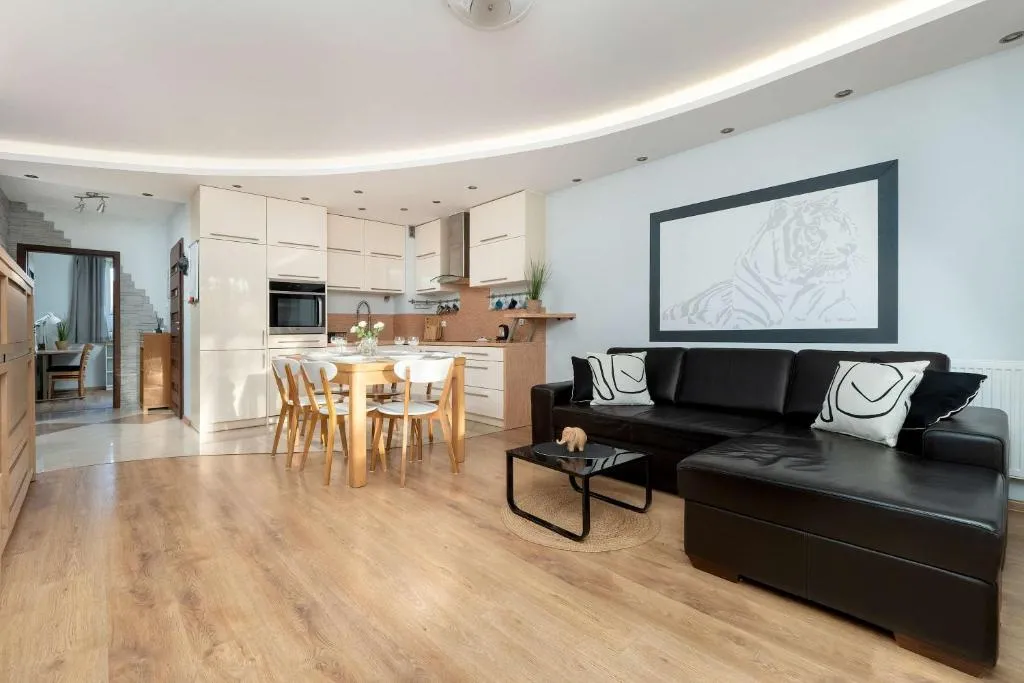 Image of Spacious Two-Bedroom Apartment with 2 Parking Spaces by Noclegi Renters