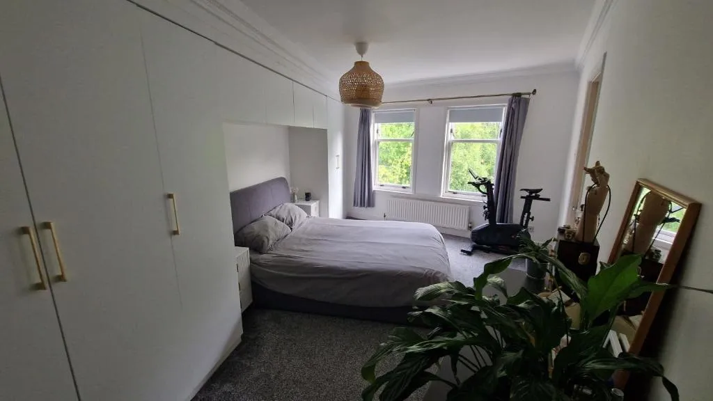 Image of Modern Three-Bedroom Apartment in Leafy West End with Private Parking