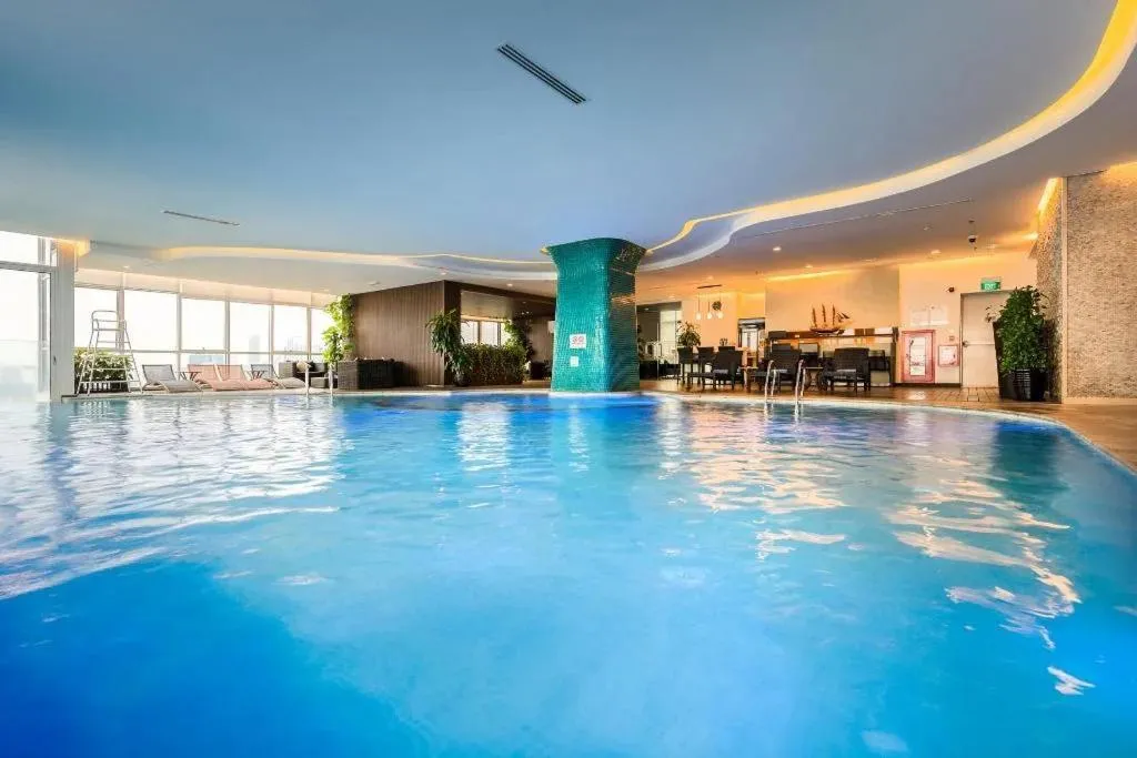 Image 1 of Centered modern Studio apartment with pool & gym