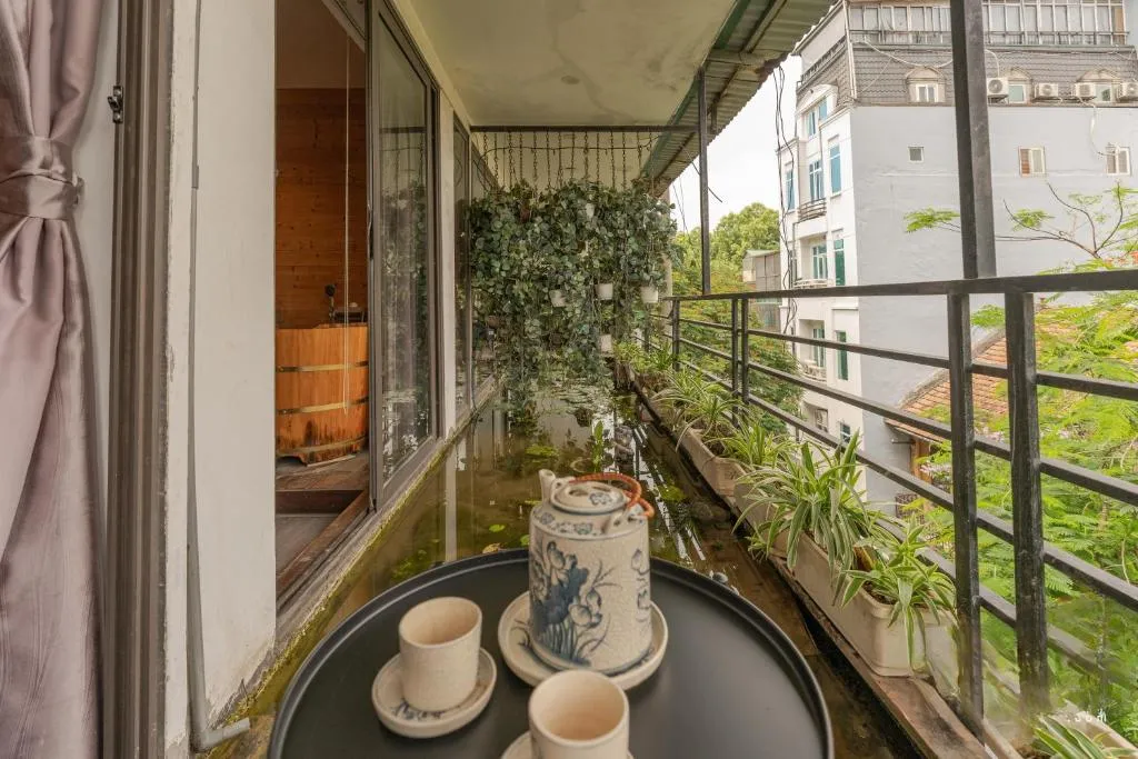 Image of PagodaView2-LotusPond-WoodenBathtub