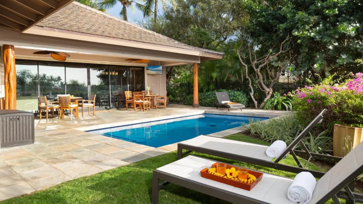 Image 3 of CORAL REEF Lush 4BR KaMilo Home with Heated Pool and Guest Cottage