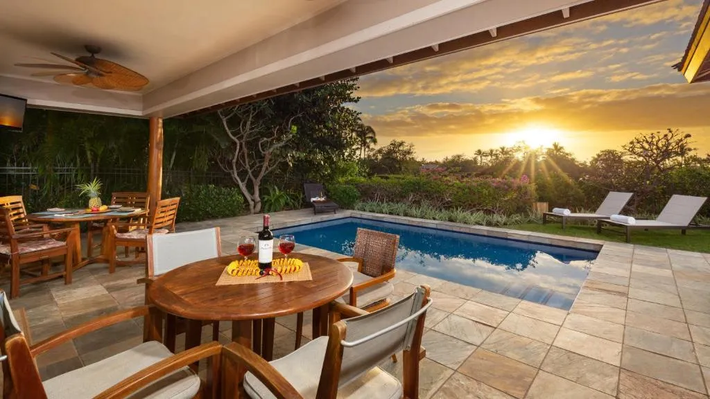 Image of CORAL REEF Lush 4BR KaMilo Home with Heated Pool and Guest Cottage