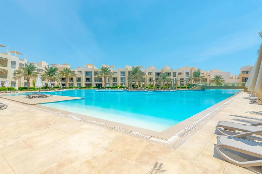 Image of Cozy 1BR Apartment in Mangroovy with pool