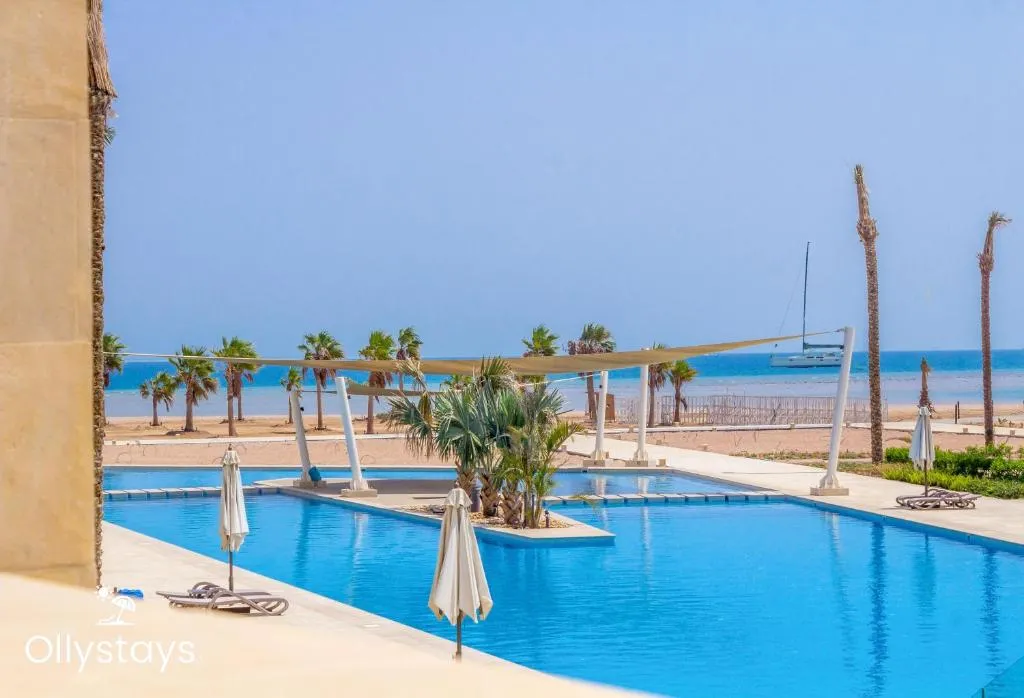 Image of Ollystays Mangroovy Seaview 1BR Beach and Pool Free access