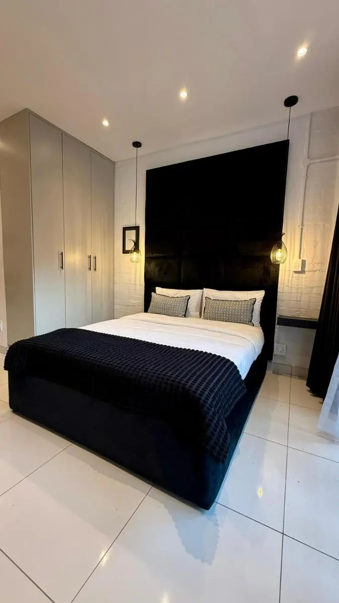 Image 3 of The Monochrome Apartment 209 – Urban Chic Escape – Open Plan Bathroom with Bathtub