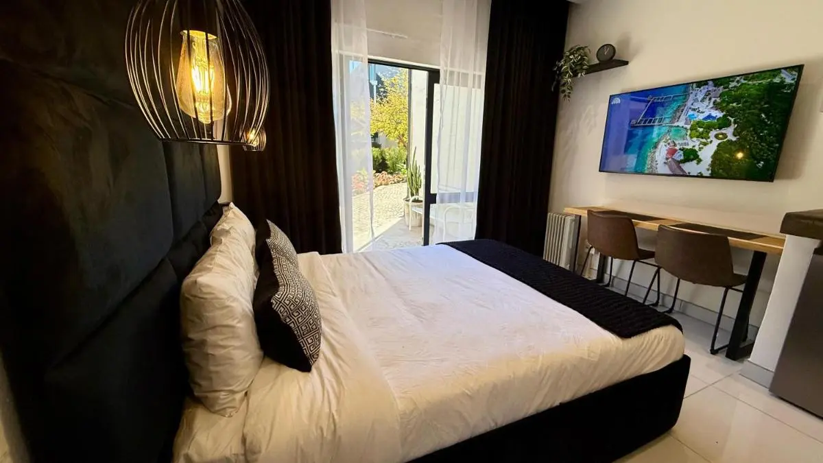 Image 2 of The Monochrome Apartment 209 – Urban Chic Escape – Open Plan Bathroom with Bathtub