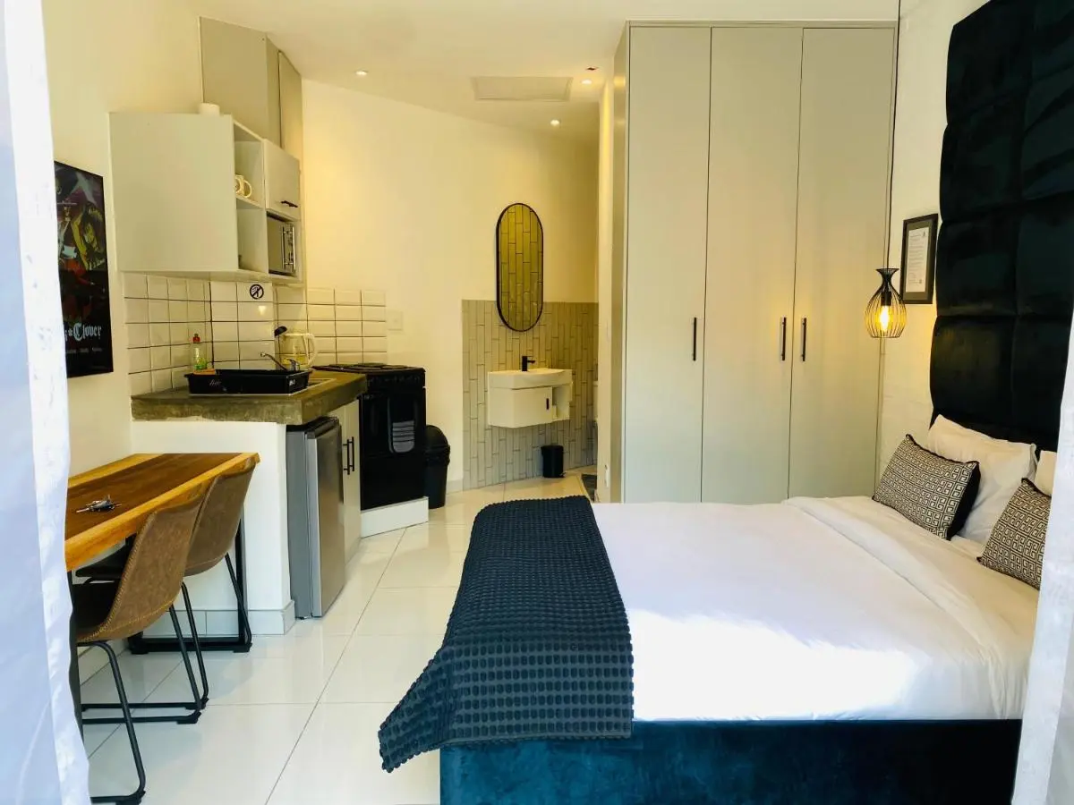 Image 1 of The Monochrome Apartment 209 – Urban Chic Escape – Open Plan Bathroom with Bathtub