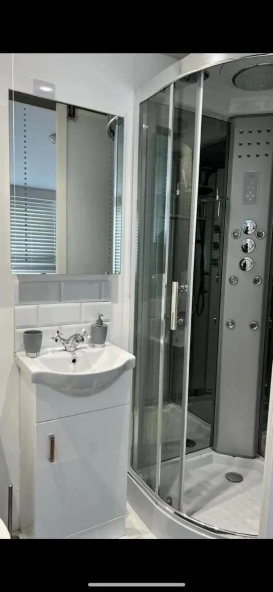 Image 2 of An En-suite with a mini kitchen and a work space