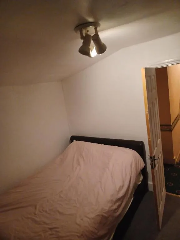 Image 1 of Cozy King Room with Shared Kitchen & Bathroom