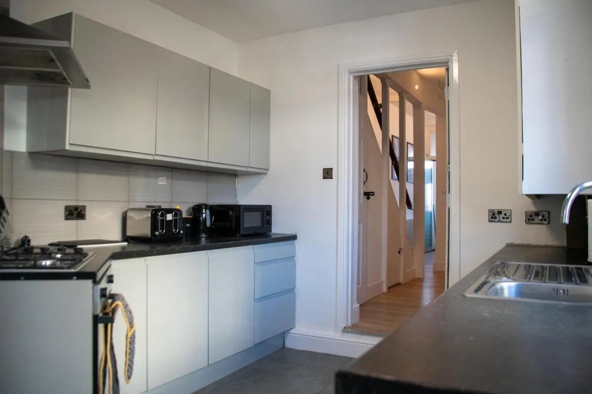 Image 3 of New! Sleek & Spacious 4BR with Parking