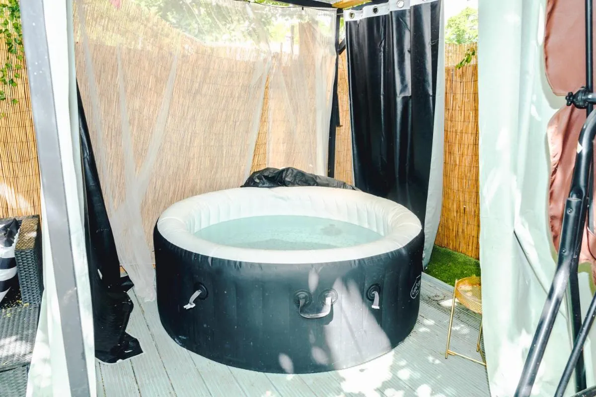 Image 3 of TranquilHaus! 3BR Retreat with Spa Saunas, Hot Tub & Garden Cinema