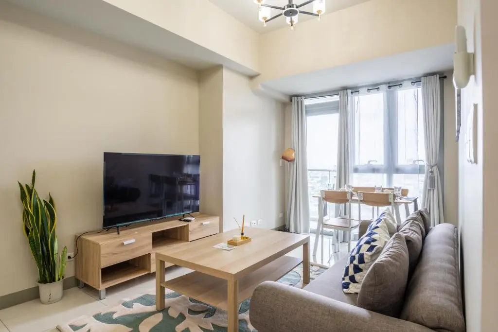Image of 2BR 2TB Uptown Parksuites BGC Balcony,fast WiFi,Washer