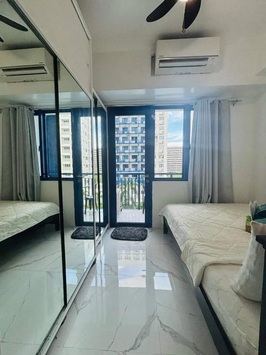 Image 1 of Affordable Staycation At Sea Residence Near Moa By Dona Flores