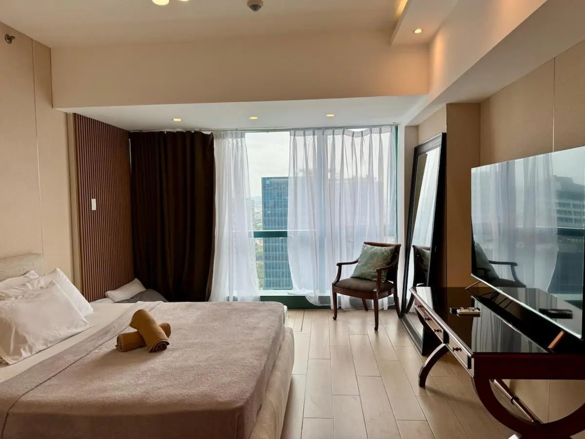 Image 6 of BGC One Uptown Premium 2BR Suite with Balcony near Supermarket, Malls and Restaurants