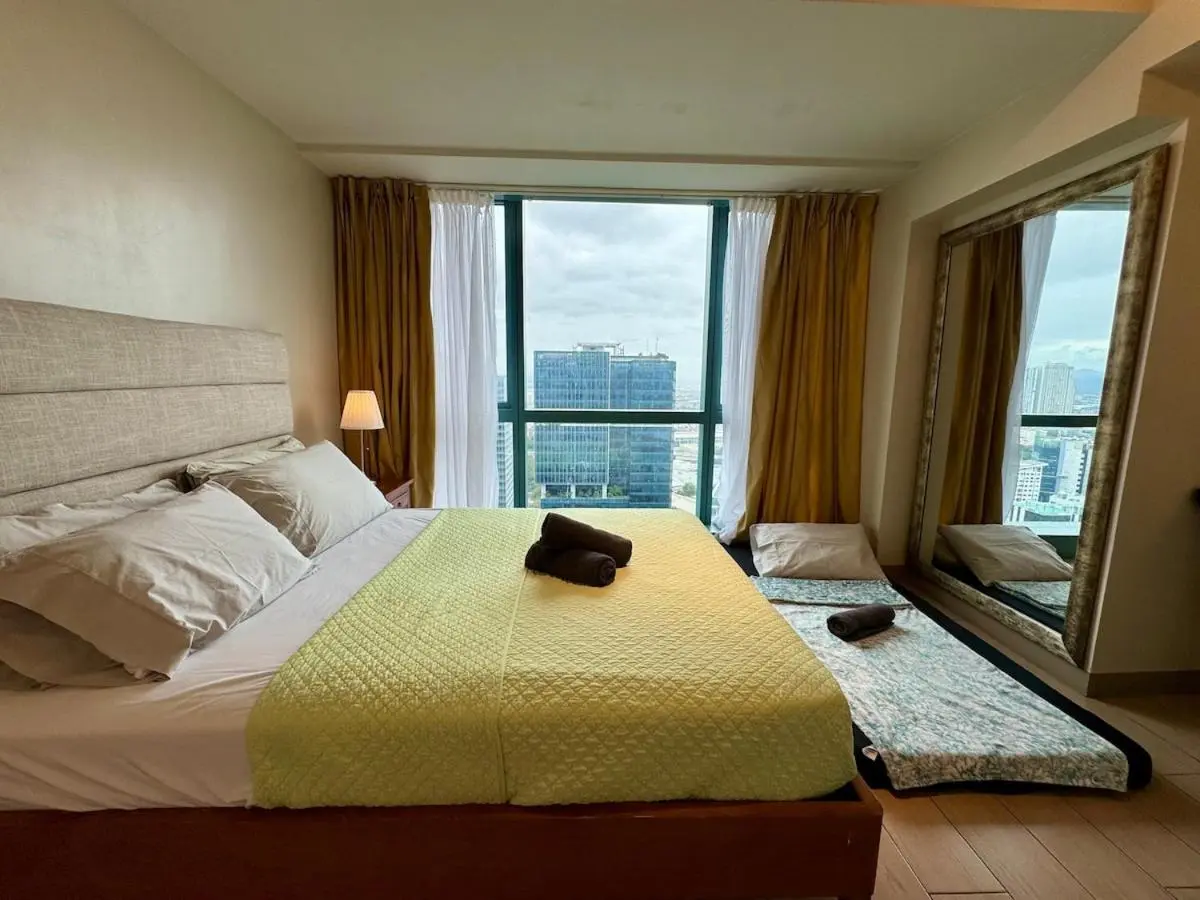 Image 1 of BGC One Uptown Premium 2BR Suite with Balcony near Supermarket, Malls and Restaurants