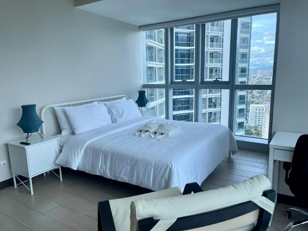 Image of Bright 2-bedroom condo with pool in BGC Uptown
