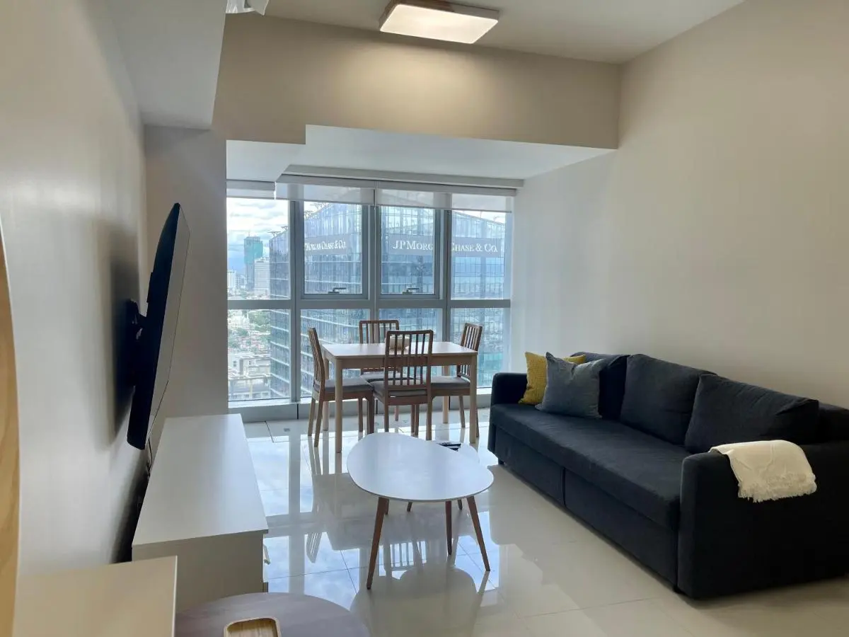 Image 4 of Bright 2-bedroom condo with pool in BGC Uptown