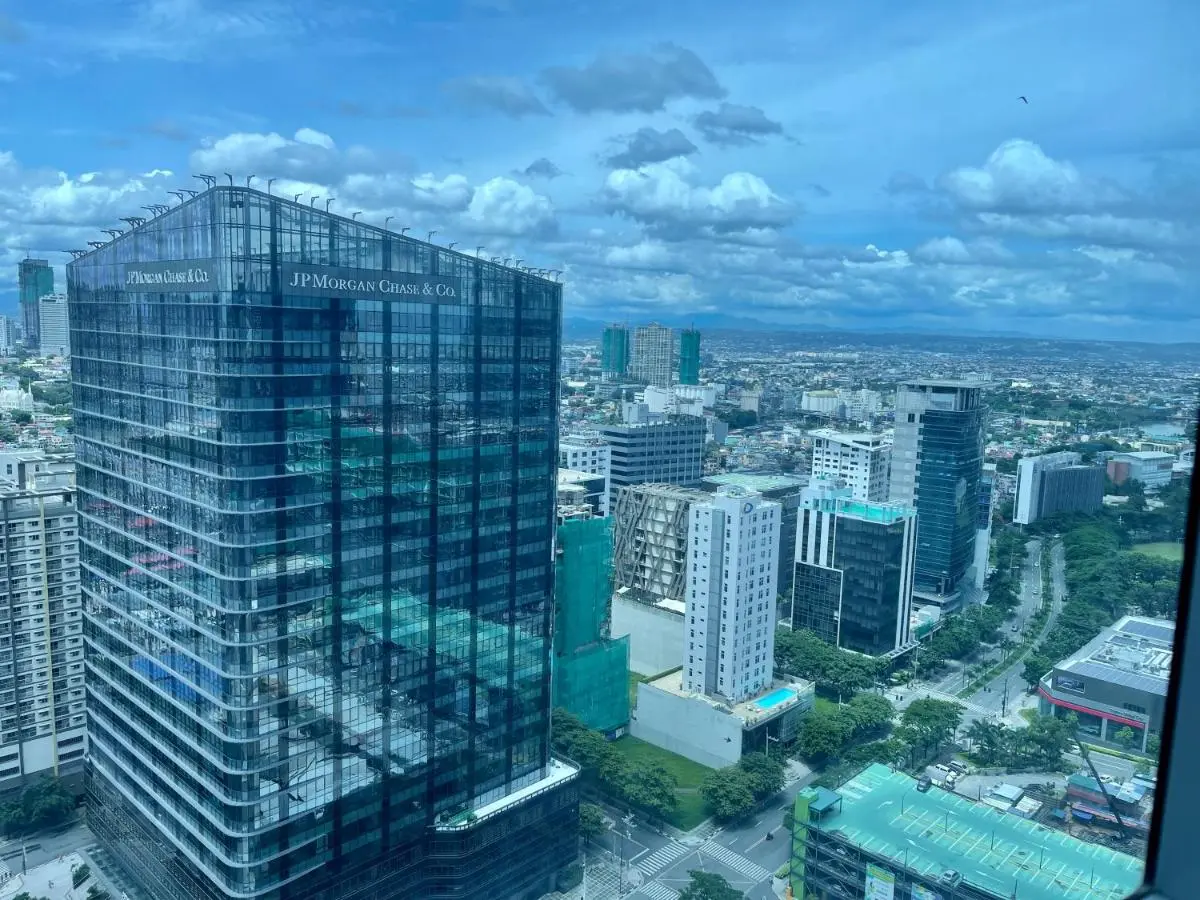 Image 6 of Bright 2-bedroom condo with pool in BGC Uptown