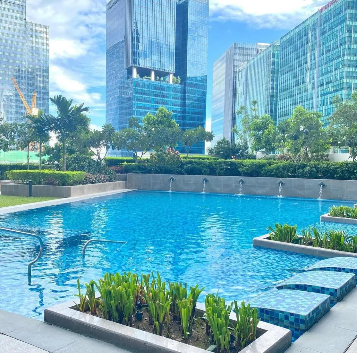 Image 3 of Bright 2-bedroom condo with pool in BGC Uptown