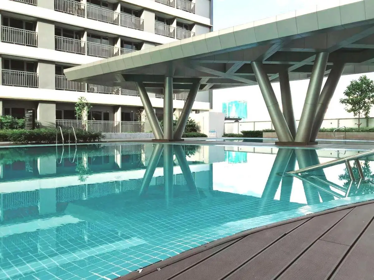 Image 2 of Cairong Inn Condominium pool TV with Netflix FAME RESIDENCES