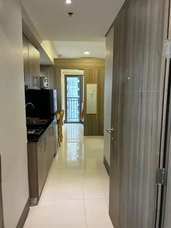 Image of Cairong Inn Condominium pool TV with Netflix FAME RESIDENCES