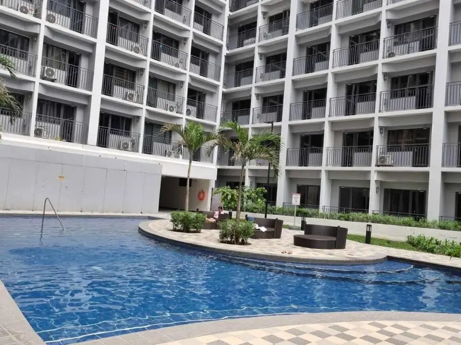 Image of Cozy Shore Residence with balcony near Mall of Asia & airport