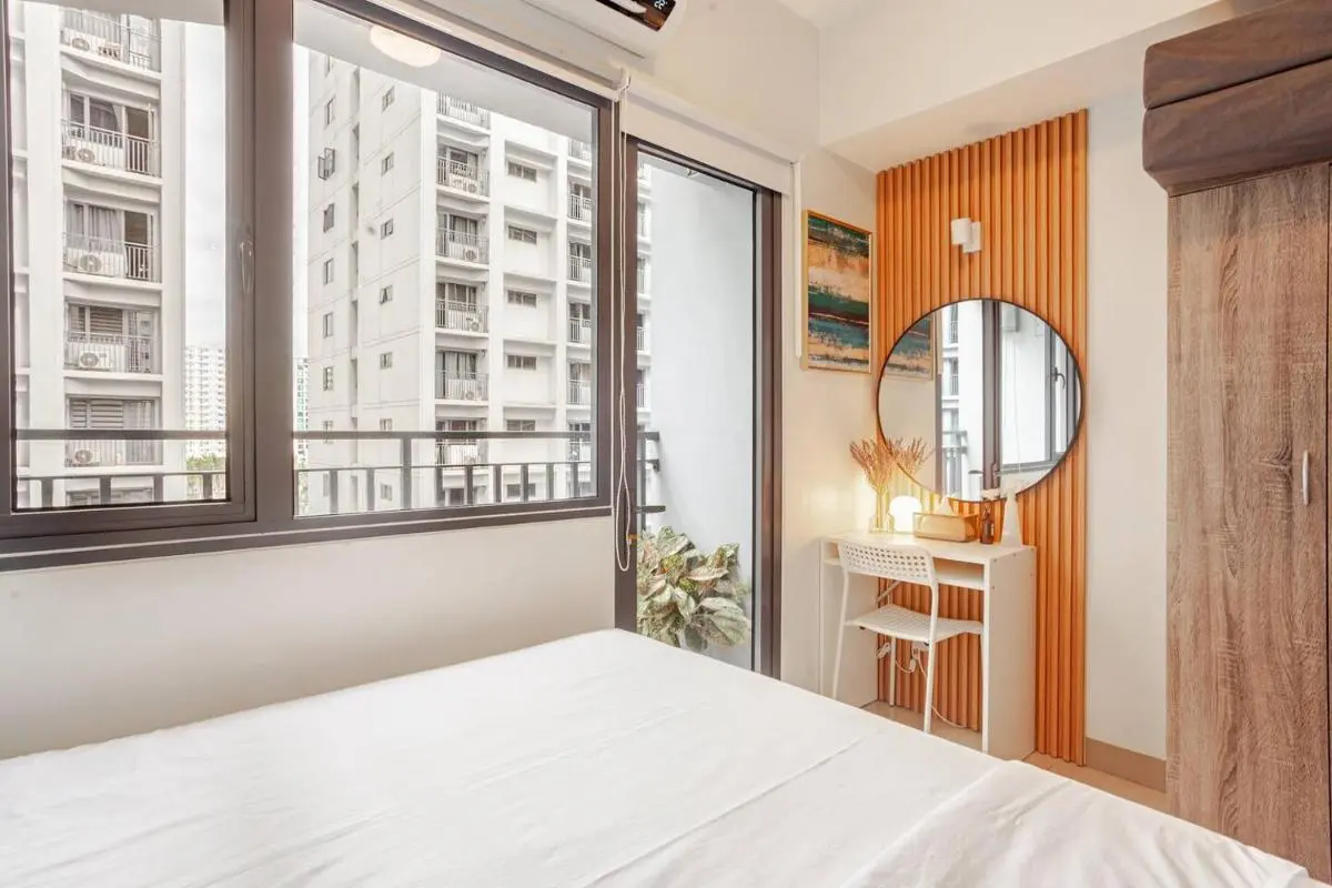 Image 6 of Cozy & Homey 1BR Apartment near MOA facing Pool with Own Parking with Netflix & DisneyPlus & up to 200mbps Wifi