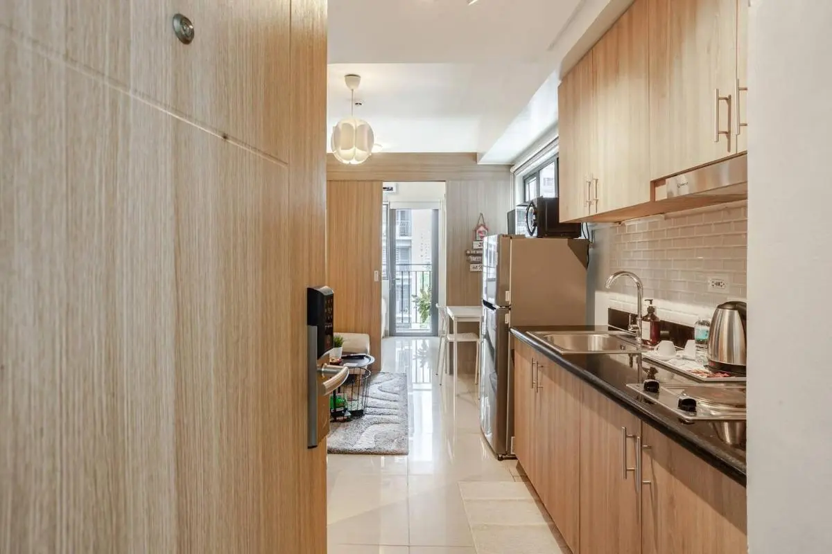 Image 4 of Cozy & Homey 1BR Apartment near MOA facing Pool with Own Parking with Netflix & DisneyPlus & up to 200mbps Wifi