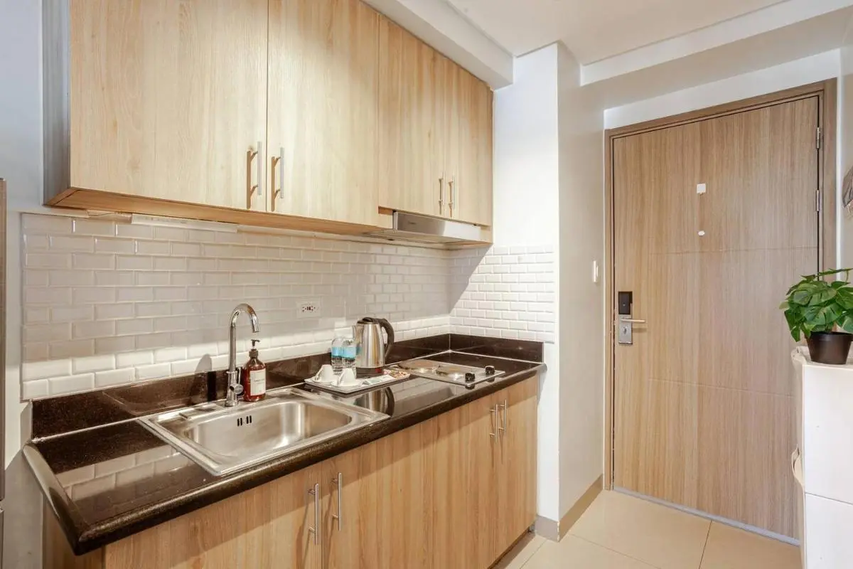 Image 2 of Cozy & Homey 1BR Apartment near MOA facing Pool with Own Parking with Netflix & DisneyPlus & up to 200mbps Wifi