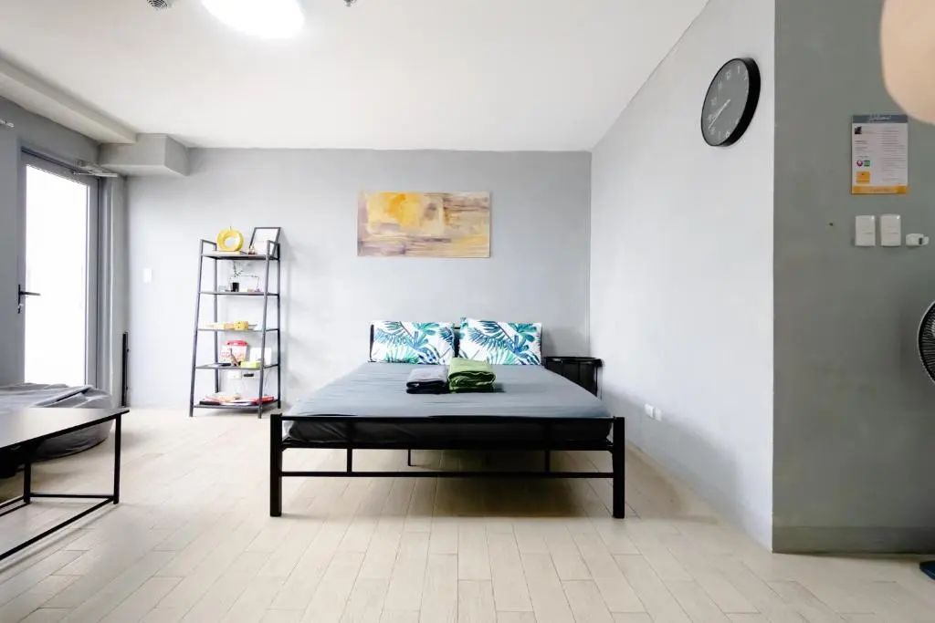 Image of Cubao Manhattan Plaza Residential Condo T139G – HUGE Studio with Pool, Kitchen & Balcony, Walk Distance to Araneta Coliseum LRT MRT Malls in Cubao Quezon City – Staycations by SMS