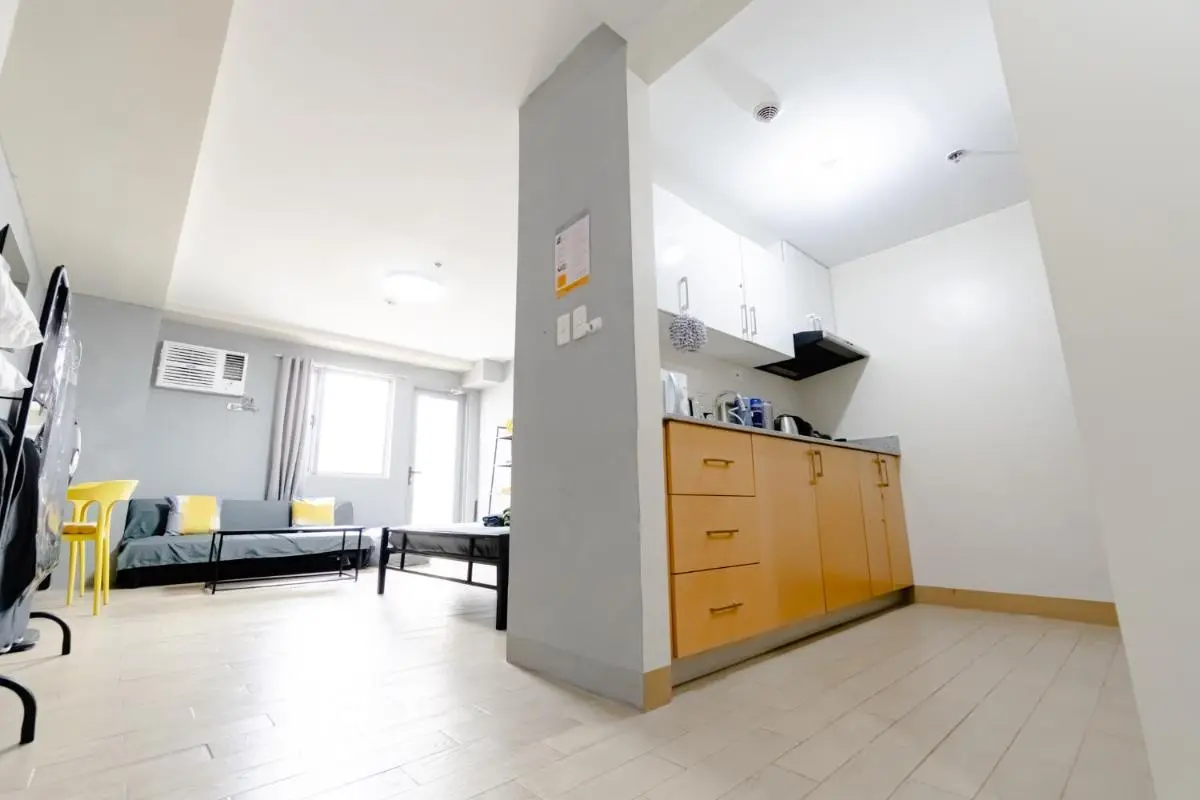 Image 2 of Cubao Manhattan Plaza Residential Condo T139G – HUGE Studio with Pool, Kitchen & Balcony, Walk Distance to Araneta Coliseum LRT MRT Malls in Cubao Quezon City – Staycations by SMS