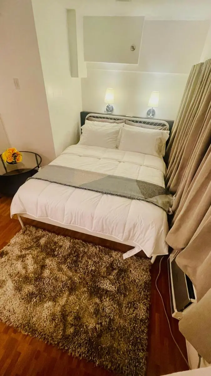 Image 1 of Modern Condo for Couple with Wi-Fi, Netflix & Kitchen, 1 min to MRT Boni