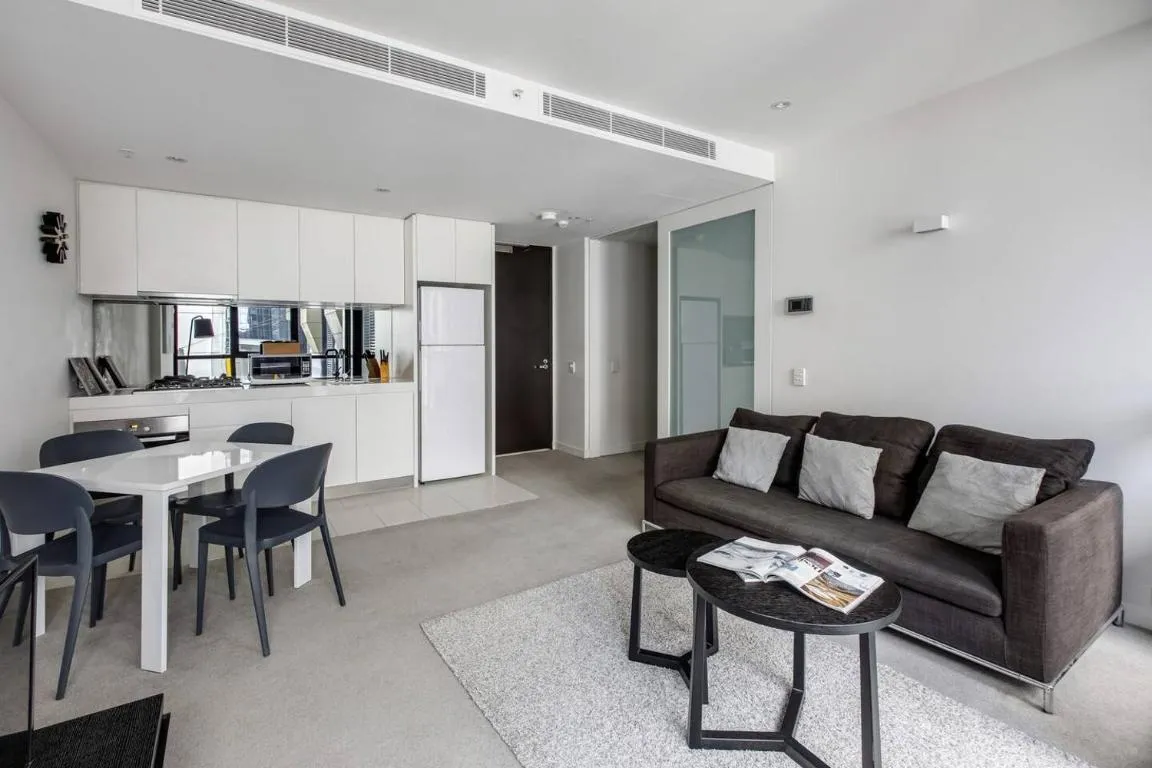 Sleek Urban Haven with Parking and Rooftop Terrace