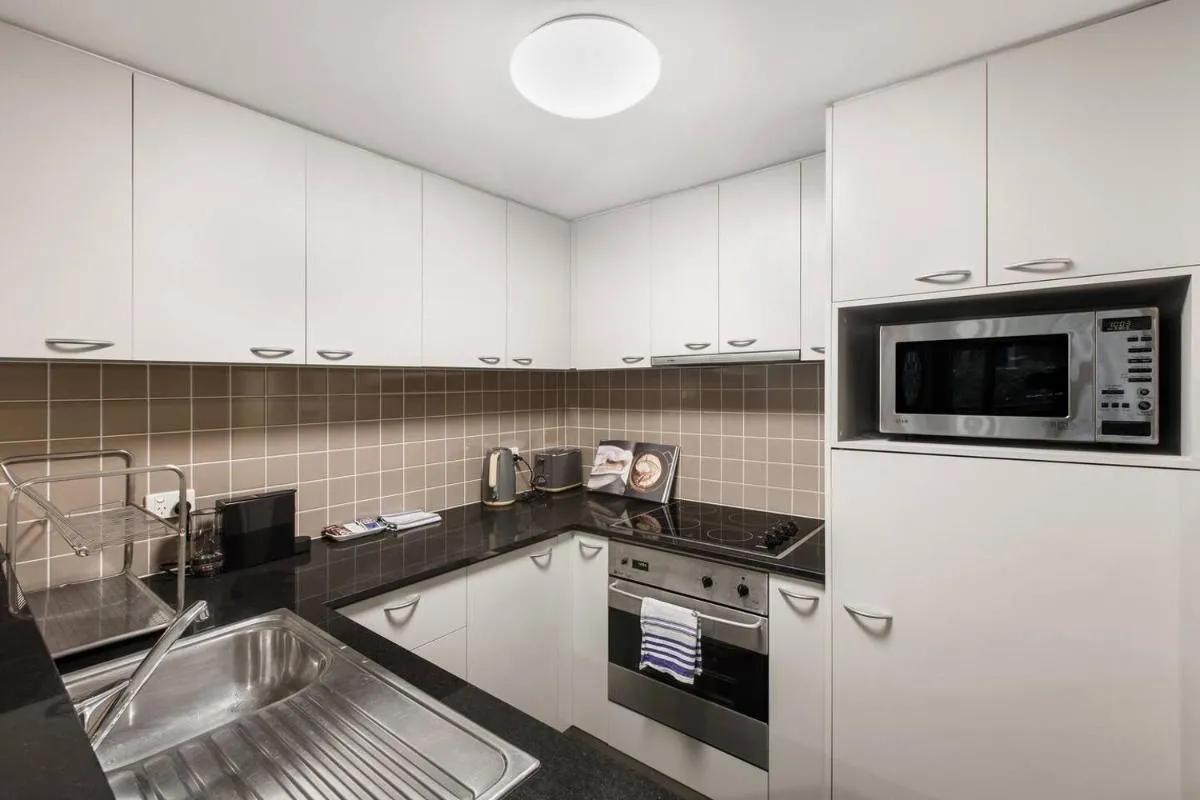 Spacious Inner-city Stay with King Bed and Balcony — 5