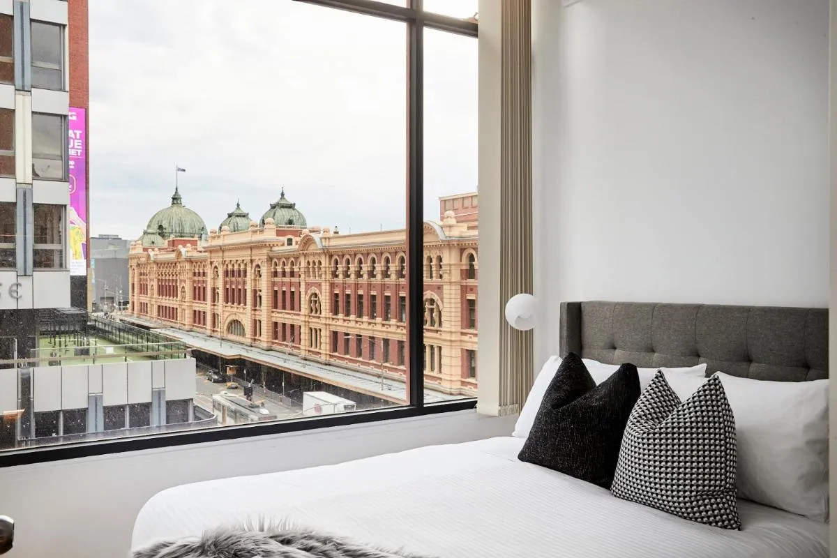2BR – Large balcony facing Flinders Street Station — 2