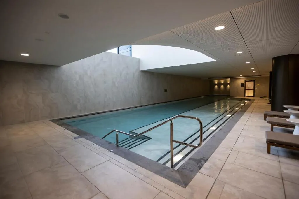 Modern 2BR Abode with Balcony View Gym Access