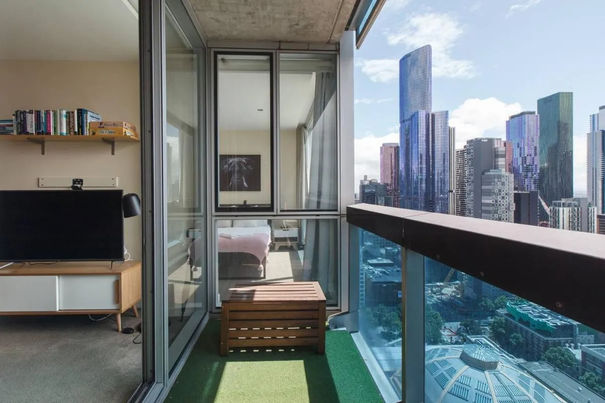 Modern Escape with Balcony & Sweeping City Views — 4