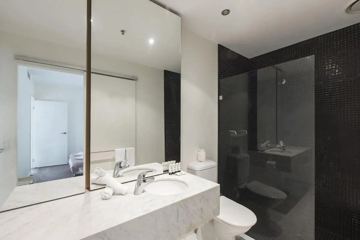 Modern Escape with Balcony & Sweeping City Views — 3